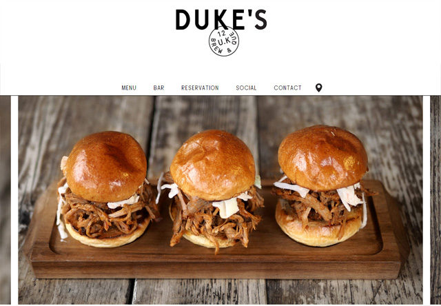 Image of a restaurant website: Duke's Brew &amp; Que